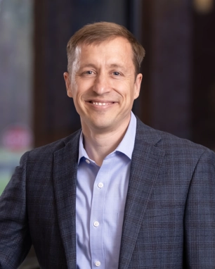 portrait of a smiling person in professional attire